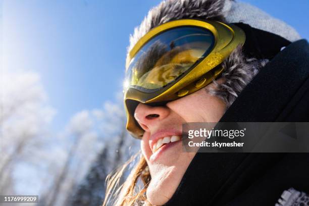close up of happy woman with ski goggles. - alpine skiing stock pictures, royalty-free photos & images