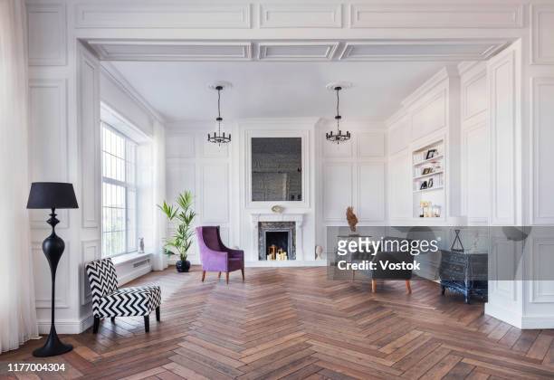 loft studio apartment in a classic style - living room floor stock pictures, royalty-free photos & images