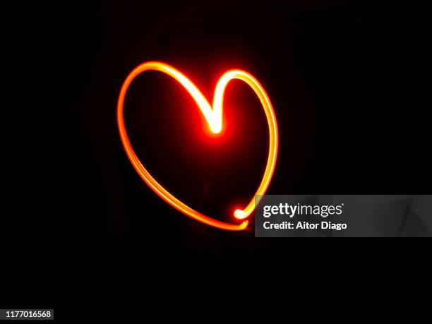 heart shape with futuristic red lines. - heart abstract stock-fotos und bilder