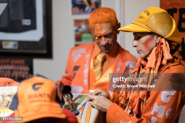 Giants fans Kath and Seb Dell'Orefice prepare for Saturday's 2019 AFL Grand Final on September 25, 2019 in Sydney, Australia. Kath and Seb have been...