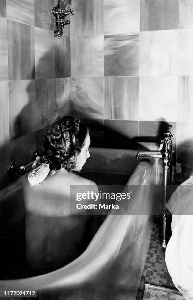 Woman in the basin of a luxury appartment of the victoria motorship. 1930.