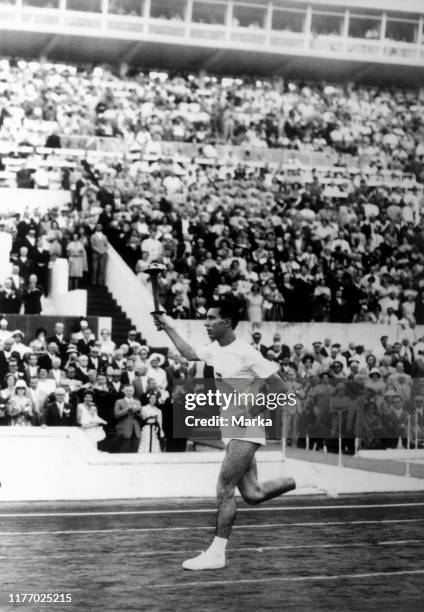 Torchbearer. Games of the XVII Olympiad. Lazio. Rome. Italy 1960.