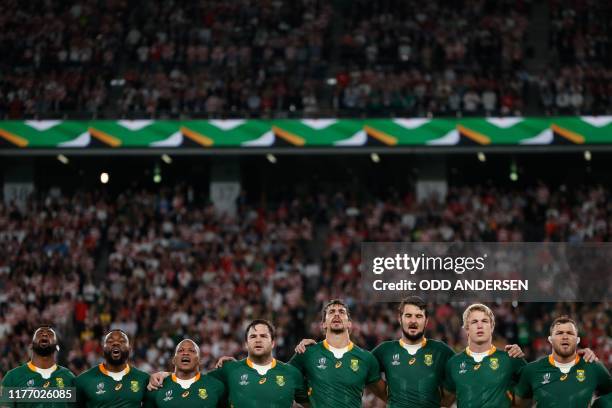 South Africa's players sing the national anthem before the Japan 2019 Rugby World Cup quarter-final match between Japan and South Africa at the Tokyo...