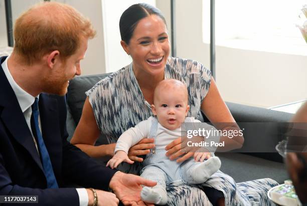 Prince Harry, Duke of Sussex, Meghan, Duchess of Sussex and their baby son Archie Mountbatten-Windsor meet Archbishop Desmond Tutu and his daughter...