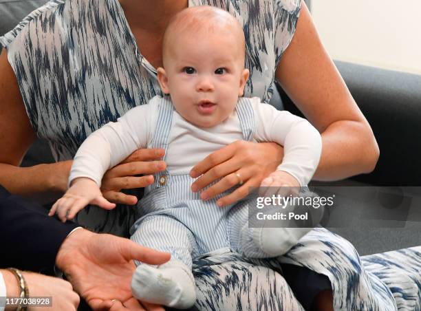 Prince Harry, Duke of Sussex, Meghan, Duchess of Sussex and their baby son Archie Mountbatten-Windsor meet Archbishop Desmond Tutu and his daughter...