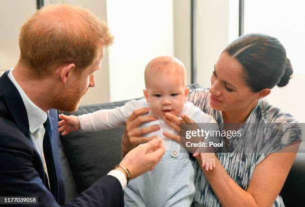 Prince Harry, Duke of Sussex, Meghan, Duchess of Sussex and their baby son Archie Mountbatten-Windsor meet Archbishop Desmond Tutu and his daughter...