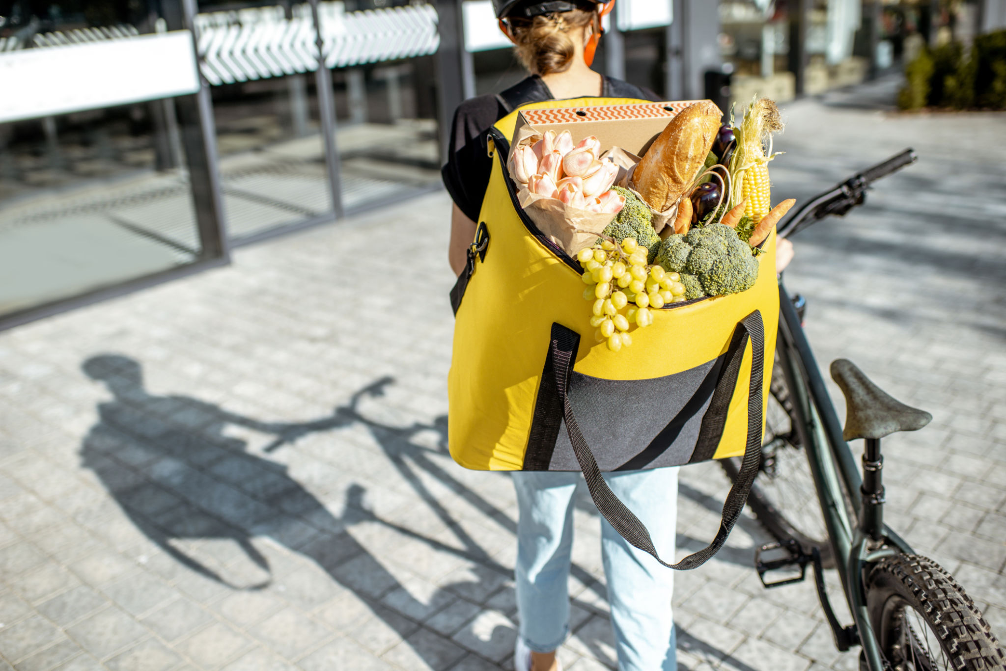 cyclist carrying groceries