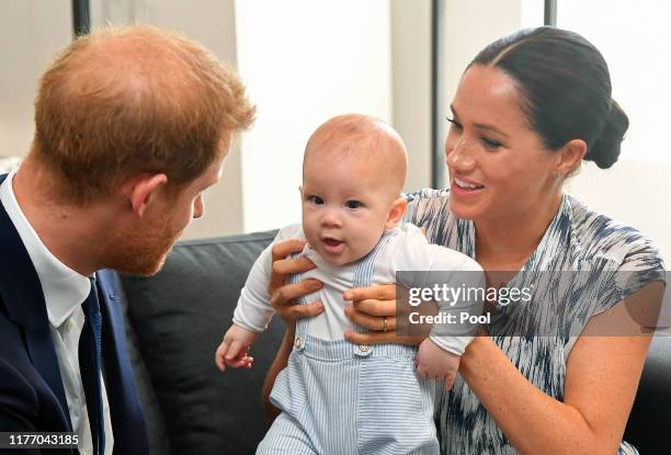 Prince Harry, Duke of Sussex, Meghan, Duchess of Sussex and their baby son Archie Mountbatten-Windsor meet Archbishop Desmond Tutu and his daughter...