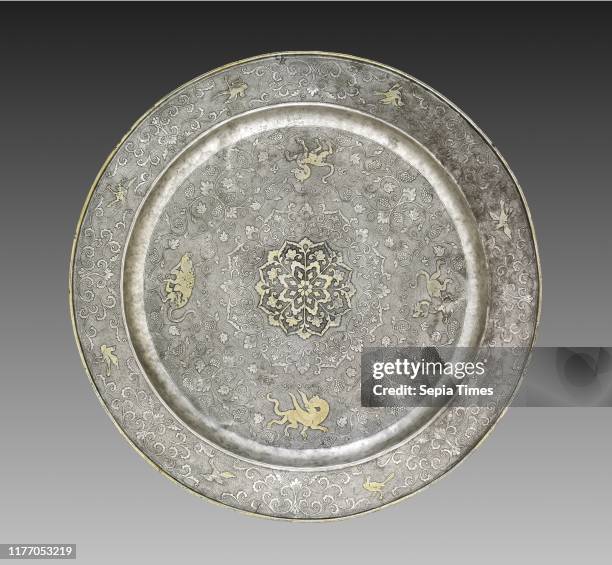 Footed Platter with Design of Mythical Beasts amid Grapevines, 700s. China, Tang dynasty . Silver with gilt, incised, and chased decoration;...
