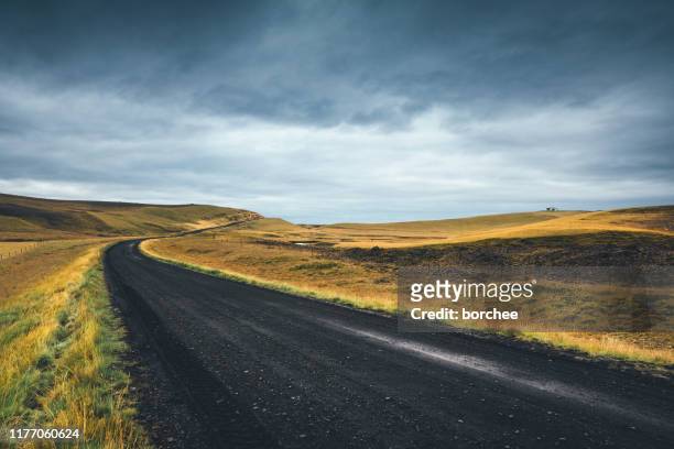 idyllic road in iceland - volcanic landscape stock pictures, royalty-free photos & images