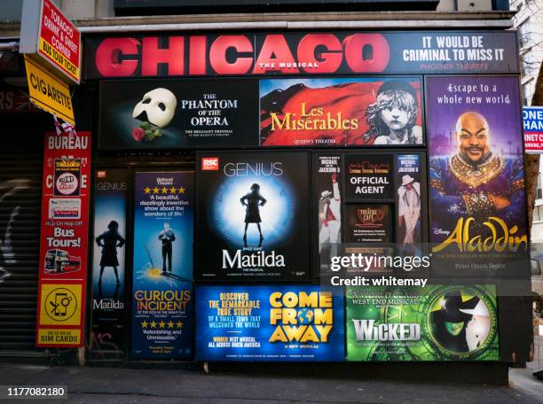 theatre posters on a wall in london - westend stock pictures, royalty-free photos & images