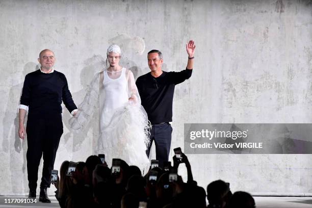 Fashion designers Christian Lacroix and Dries Van Noten walk the runway during the Dries Van Noten ready to Wear Spring/Summer 2020 fashion show as...