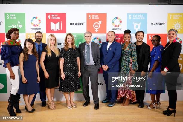 As world leaders gather in New York for the UN General Assembly, Melinda Gates and Bill Gates pose with the Goalkeepers Advisory Board during The...