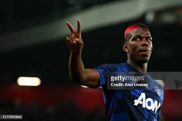 Paul Pogba of Manchester United warms up prior to the Carabao Cup Third Round match between Manchester United and Rochdale AFC at Old Trafford on...