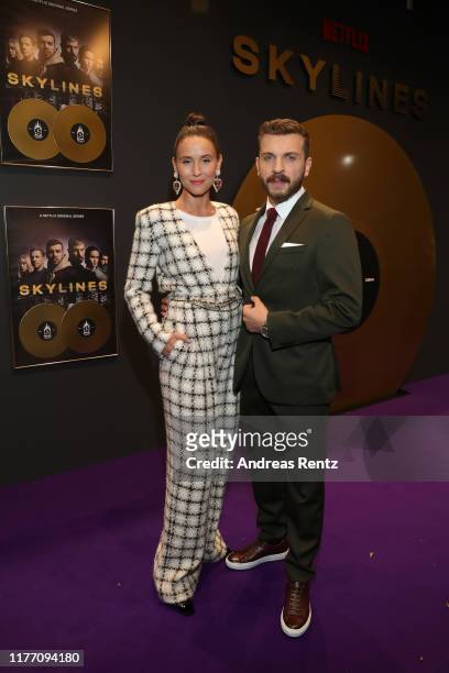 Peri Baumeister and Edin Hasanovic attend the premiere of the new Netflix series "Skylines" on September 25, 2019 in Frankfurt am Main, Germany.