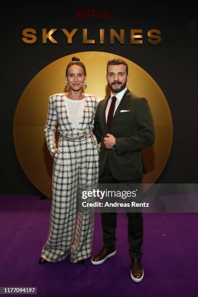 Peri Baumeister and Edin Hasanovic attend the premiere of the new Netflix series "Skylines" on September 25, 2019 in Frankfurt am Main, Germany.