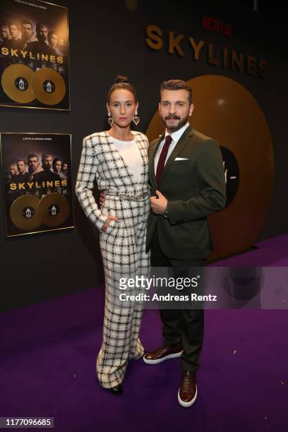 Peri Baumeister and Edin Hasanovic attend the premiere of the new Netflix series "Skylines" on September 25, 2019 in Frankfurt am Main, Germany.