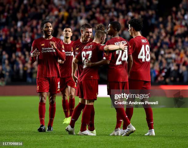 James Milner of Liverpool celebrating after scoring the opening goal during the Carabao Cup Third Round match between Milton Keynes Dons and...