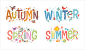 Set of decorative, illustrated words autumn, winter, spring and summer.