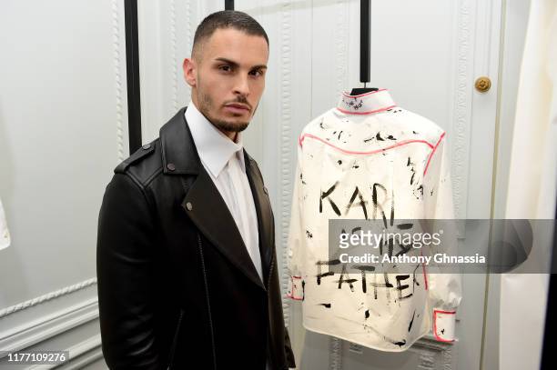 Baptiste Giabiconi attends the “Tribute to the Karl Lagerfeld: The White Shirt Project” exhibition as part of Paris Fashion Week in Paris on...