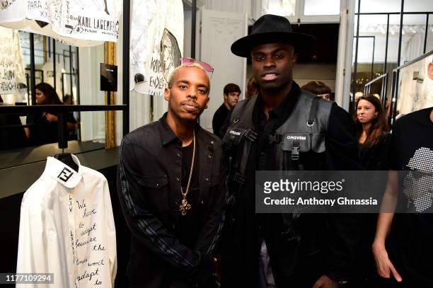 Lil Buck and attend the “Tribute to the Karl Lagerfeld: The White Shirt Project” exhibition as part of Paris Fashion Week in Paris on September 25,...
