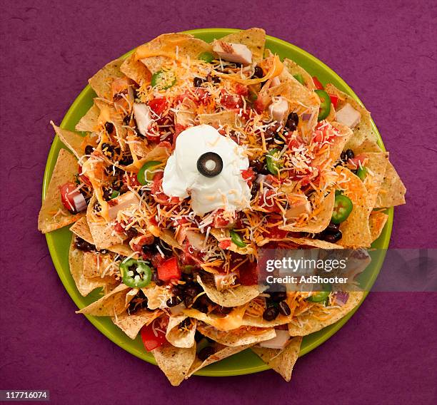 nachos - nacho chip stock pictures, royalty-free photos & images