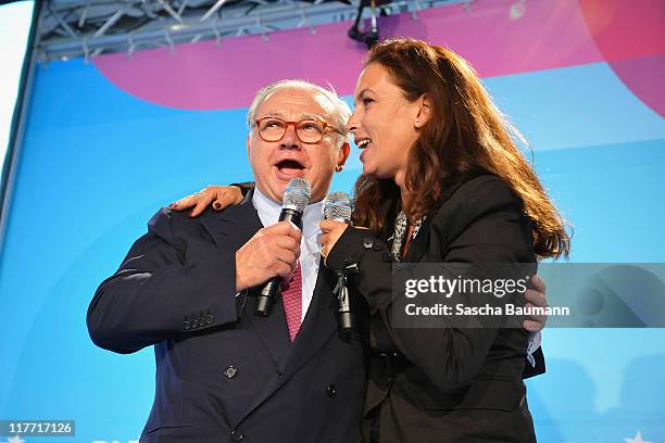 Publisher Hubert Burda and singer Judy Weiss sing during the closing ceremony of the Digital Life Design women conference at Bavarian National Museum...