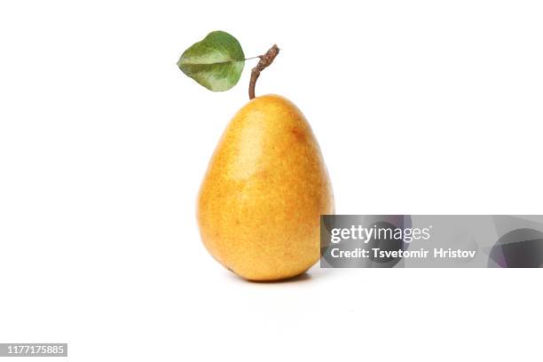 ripe yellow pears on white background - birne stock-fotos und bilder