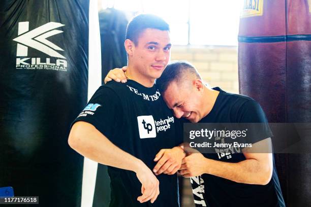 Kostya Tszyu with son Tim Tszyu laugh as they pose for a portrait during a media opportunity at Tszyu Boxing Academy on September 26, 2019 in Sydney,...