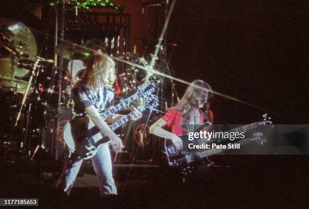 Neil Peart, Alex Lifeson and Geddy Lee of Canadian progressive rock band Rush perform on stage at Hammersmith Odeon on May 7th 1979, in London,...