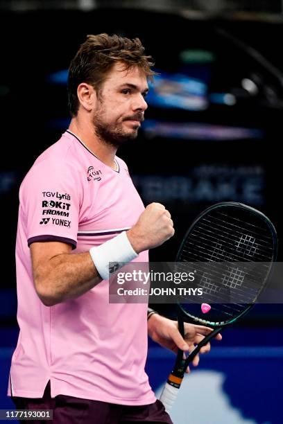 Switzerland's Stanislas Wawrinka reacts as he plays against Britain's Andy Murray during their men's single tennis final match of the European Open...