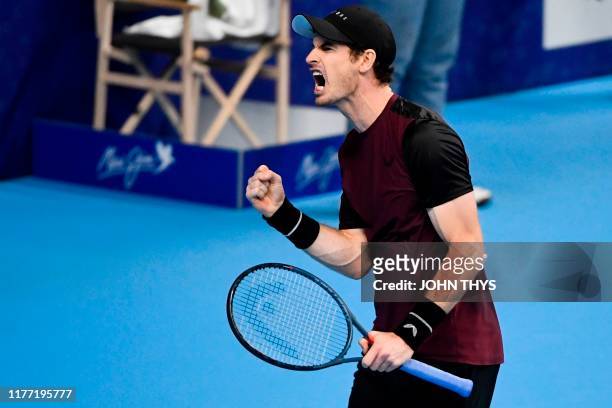 Britain's Andy Murray reacts as he plays against Switzerland's Stanislas Wawrinka during their men's single tennis final match of the European Open...