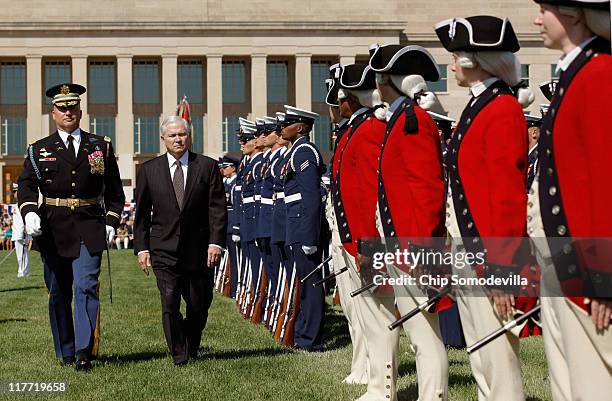 United States Secretary of Defense Robert Gates inspects soldiers, airmen, Marines, sailors and guardsmen during his Armed Forces Farewell Tribute on...