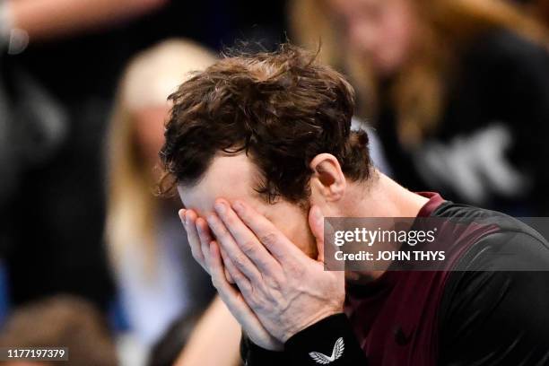 Britain's Andy Murray celebrates and reacts after winning against Switzerland's Stanislas Wawrinka in their men's single tennis final match of the...