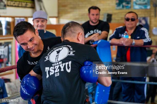 Tim Tszyu spars with his father Kostya Tszyu during a media opportunity at Tszyu Boxing Academy on September 26, 2019 in Sydney, Australia.