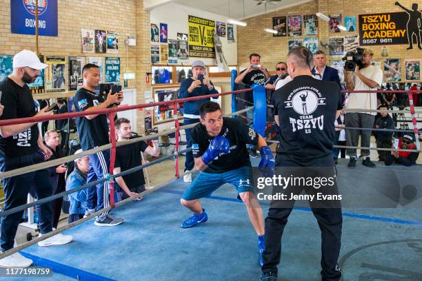 Tim Tszyu spars with his father Kostya Tszyu during a media opportunity at Tszyu Boxing Academy on September 26, 2019 in Sydney, Australia.