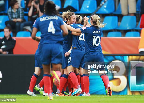 Gaetane Thiney of Francecelebrates with her team mates after scoring her team's first goal during the FIFA Women's World Cup 2011 Group A match...