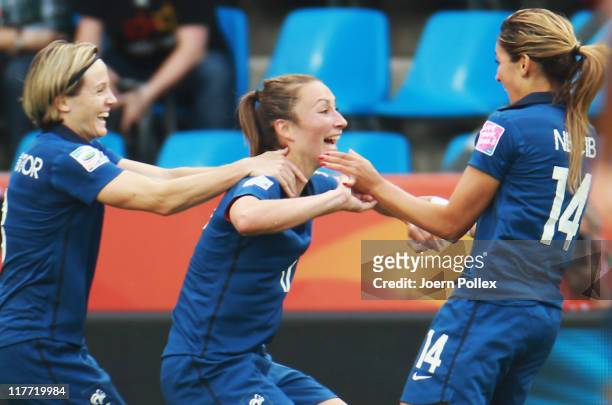 Gaetane Thiney of Francecelebrates with her team mates after scoring her team's first goal during the FIFA Women's World Cup 2011 Group A match...