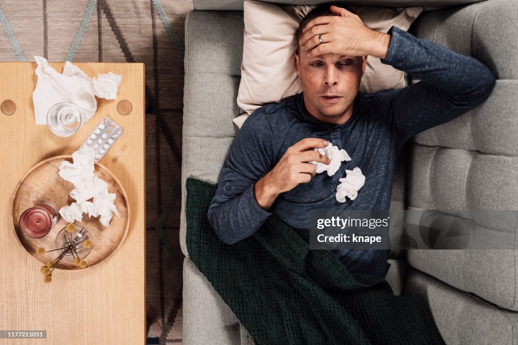 Sick man having a flu cold