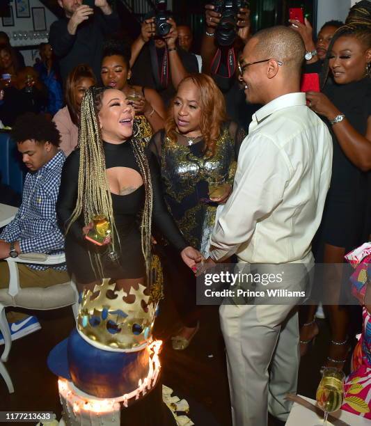 Tameka Harris, Violeta Morgan and T.I. Attend A Private Birthday Celebration Honoring TIP at The Brasserie Atlanta on September 25, 2019 in Atlanta,...