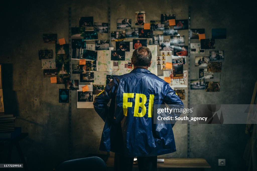 Mature FBI agent works on a case alone