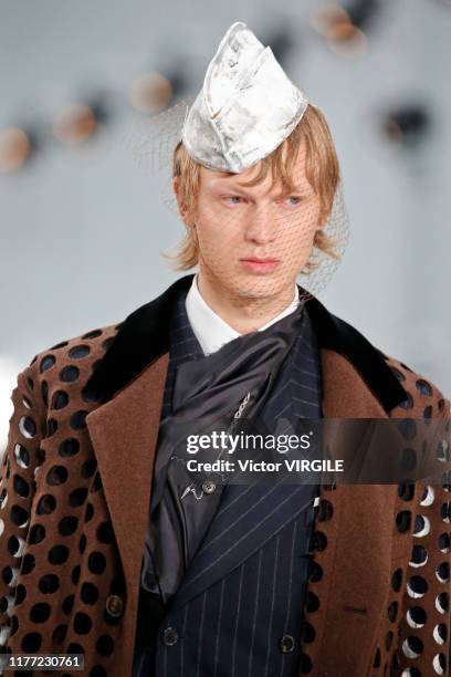 Model walks the runway during the Maison Margiela Ready to Wear Spring/Summer 2020 fashion show as part of Paris Fashion Week on September 25, 2019...