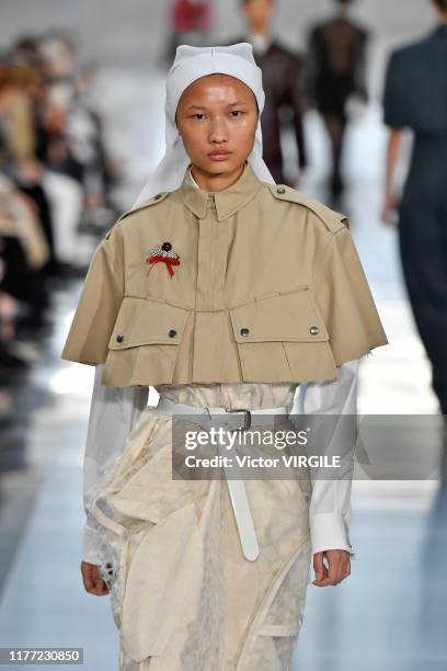 Model walks the runway during the Maison Margiela Ready to Wear Spring/Summer 2020 fashion show as part of Paris Fashion Week on September 25, 2019...