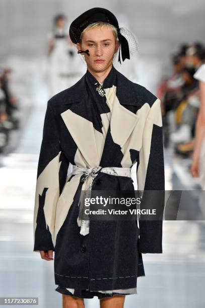 Model walks the runway during the Maison Margiela Ready to Wear Spring/Summer 2020 fashion show as part of Paris Fashion Week on September 25, 2019...