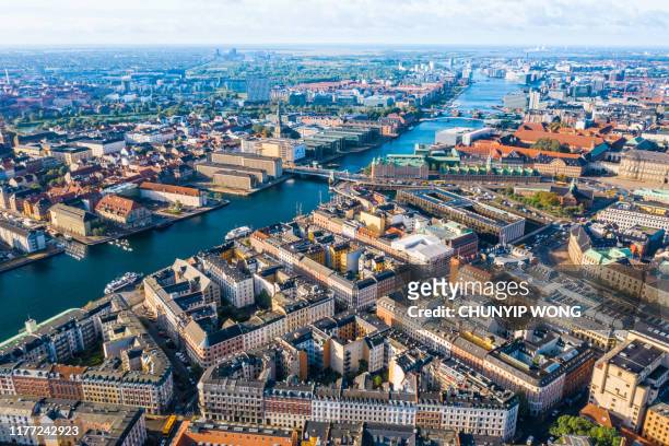 copenhagen, denmark. new harbour canal and entertainment famous street. aerial shoot view from the top - copenhagen stock pictures, royalty-free photos & images