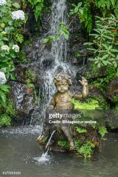 Cherub, fountain, Monte Palace Tropical Garden, Monte, Funchal, Madeira.