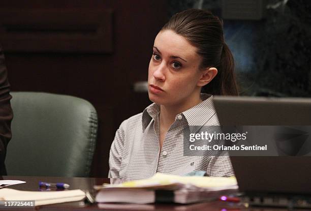 Casey Anthony listens during testimony in her murder trial at the Orange County Courthouse in Orlando, Florida, Thursday, June 30, 2011.