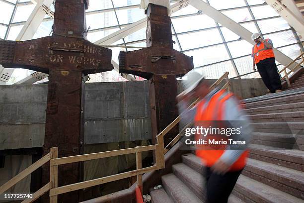 Two of the original World Trade Center tridents are seen in the museum pavillion as work continues on the National September 11 Memorial & Museum at...