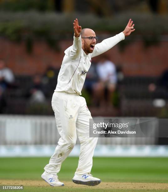 Jack Leach of Somerset appeals successfully for the wicket of Aron Nijjar during Day Four of the Specsavers County Championship Division One match...