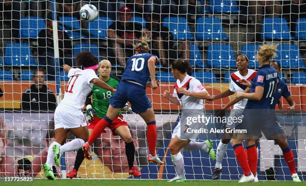 Camille Abily of France scores her team's third goal during the FIFA Women's World Cup 2011 Group A match between Canada and France at the Fifa...